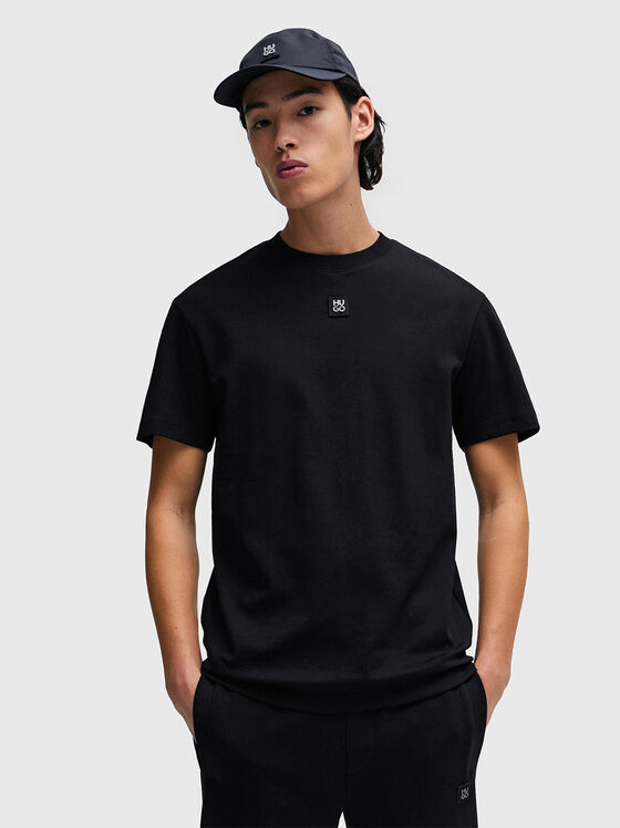 Cotton T-shirt with oval neckline in black - 1