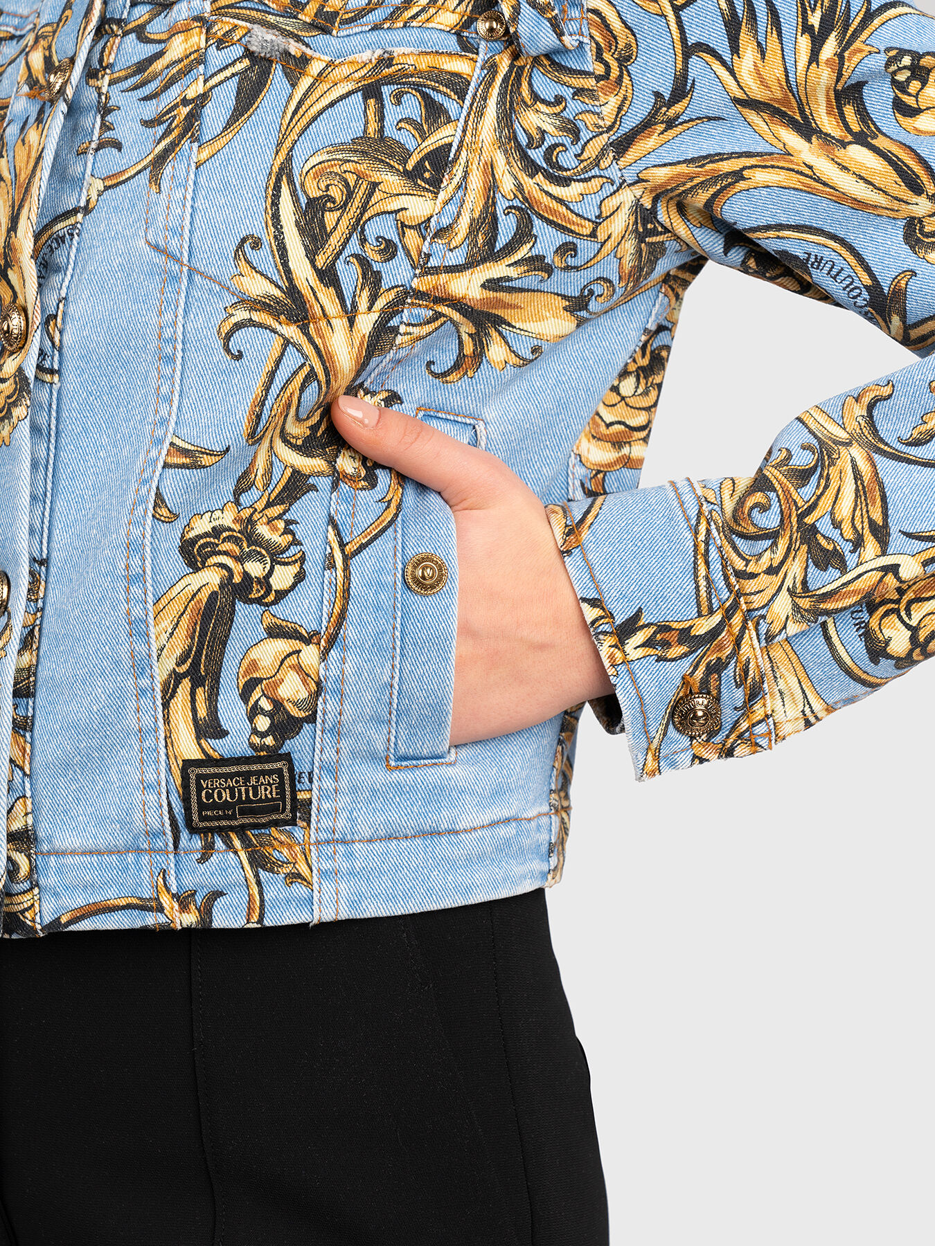 Denim jacket with baroque print brand VERSACE JEANS COUTURE Globalbrandsstore en