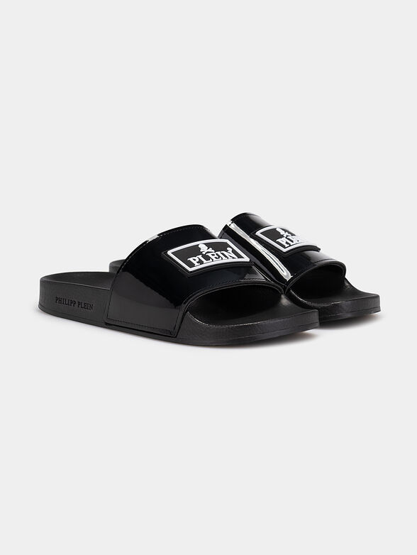 Slides in black with logo detail - 2