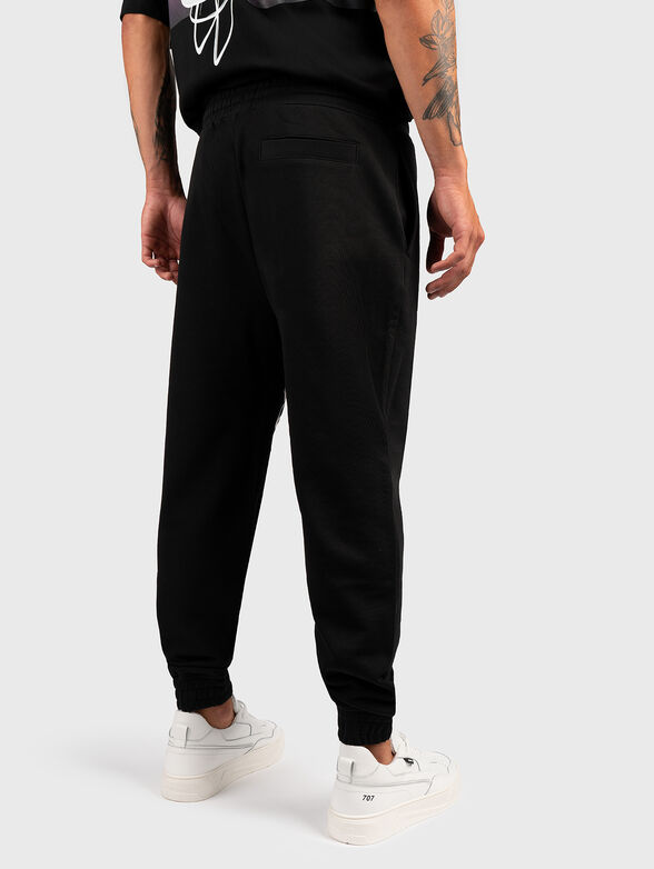 Black sports trousers with graffiti print - 2
