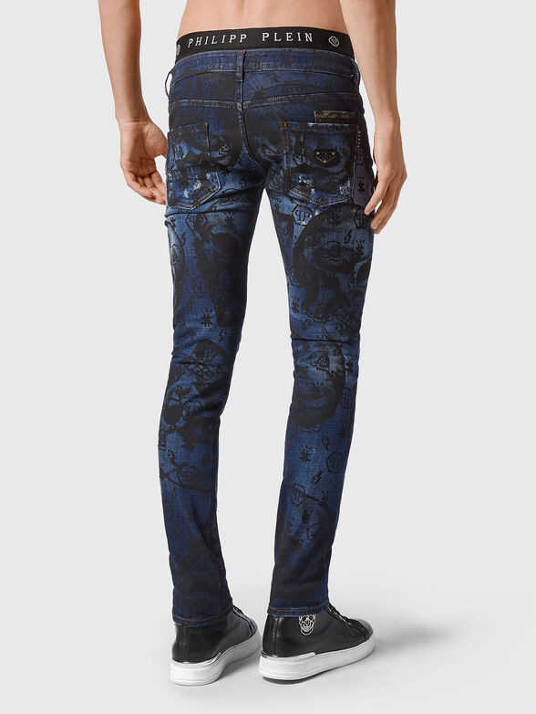 Jeans with washed effect and print - 2