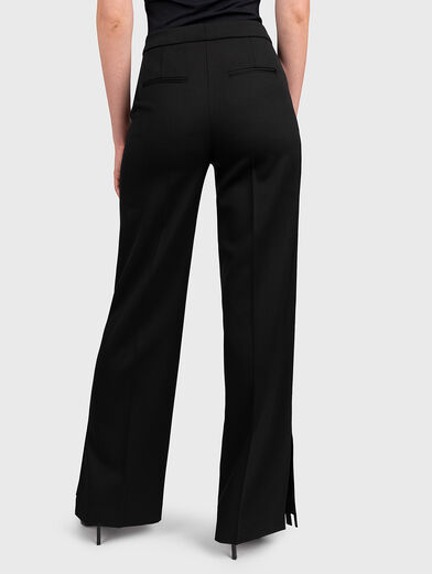 Trousers with flared legs with slits - 2