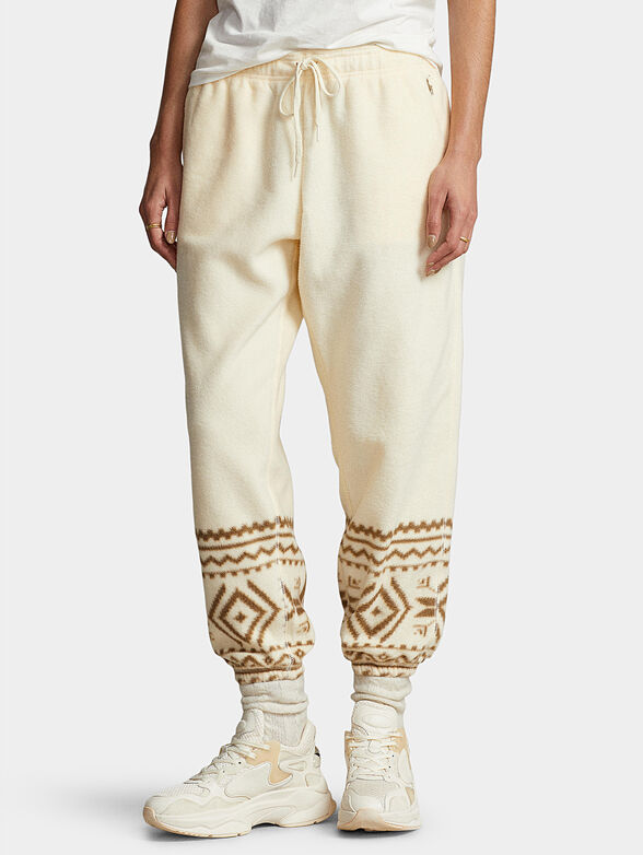 Sports pants with contrasting print - 0