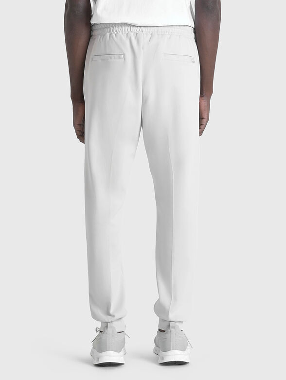 Trousers with elastic waist and pockets - 2
