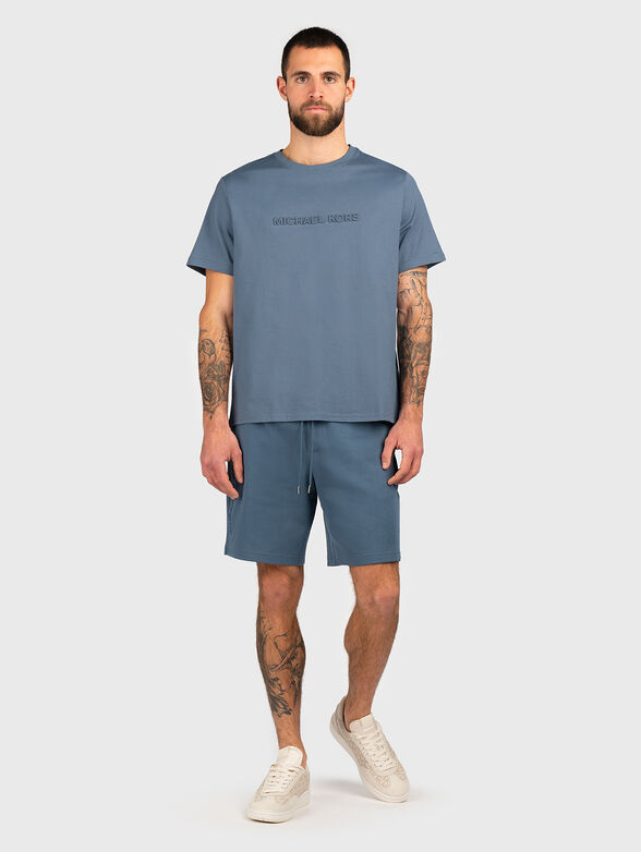 Beige shorts with embossed logo - 4