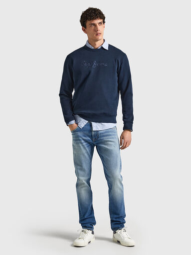 Light blue jeans with accent rips  - 5