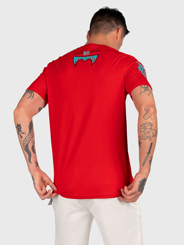 Red T-shirt with colorful print - 1