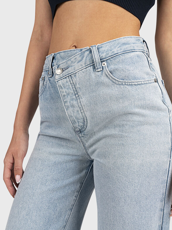 Light blue jeans with asymmetric fastening - 3