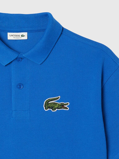 Polo shirt in blue with logo detail  - 5