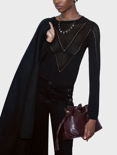 Sweater with accent cutouts - 4