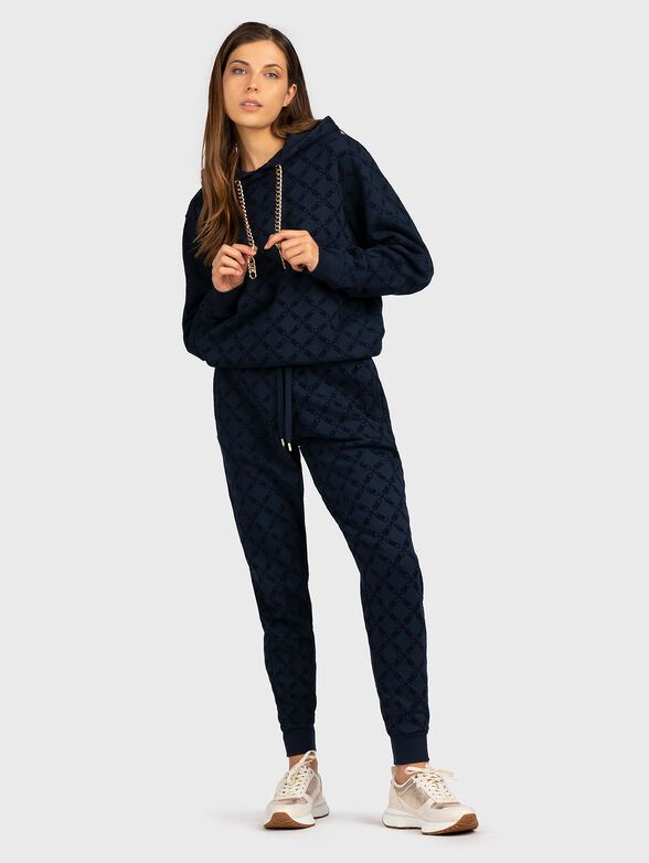 Sports trousers with monogram print - 4