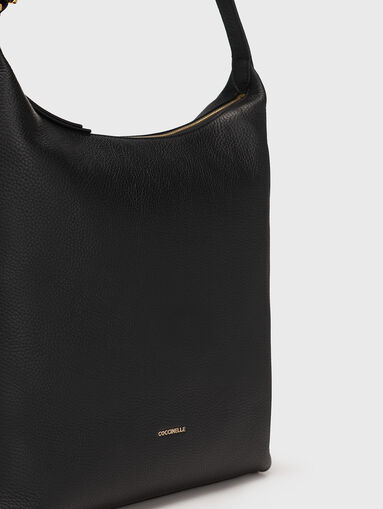 Black leather bag with grainy texture - 4