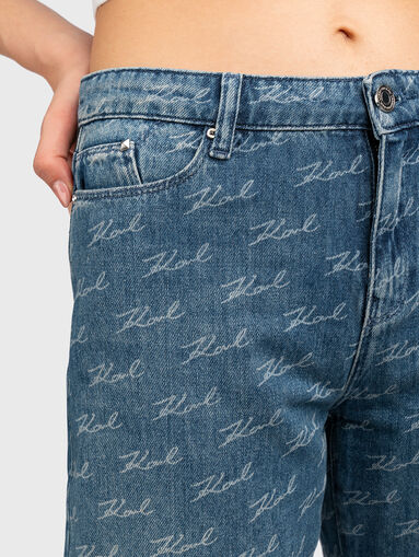Blue jeans with logo print - 4