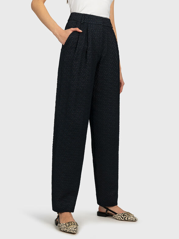 Embroidered pants in dark blue - 1