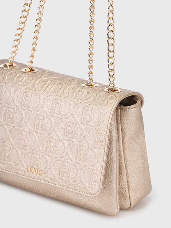 Gold bag with monogram logo texture - 5