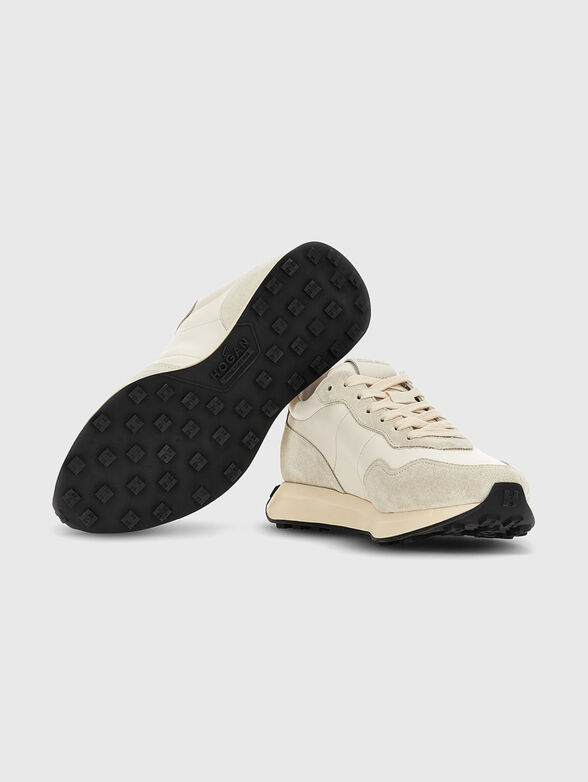 Leather sneakers with a contrasting logo - 4