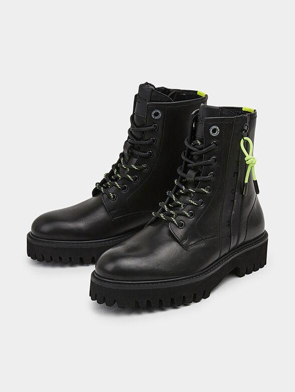 Black leather ankle boots with logo detail - 1