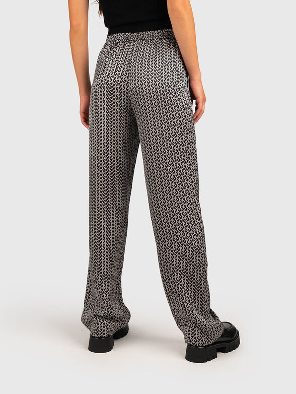 Loose fit trousers with monogram - 2