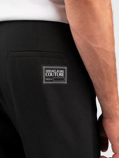 Black trousers with accent zippers  - 3