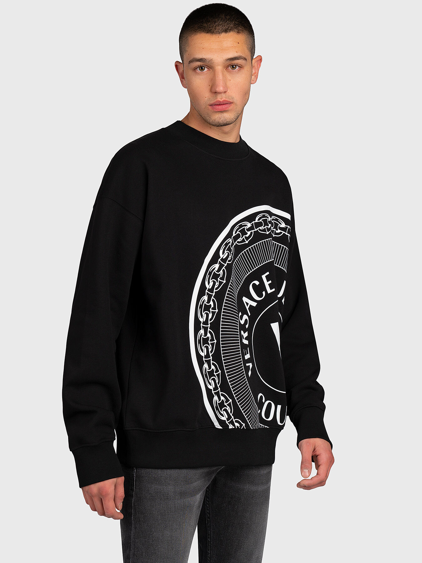 Black sweatshirt with logo emblem brand VERSACE JEANS COUTURE Globalbrandsstore en