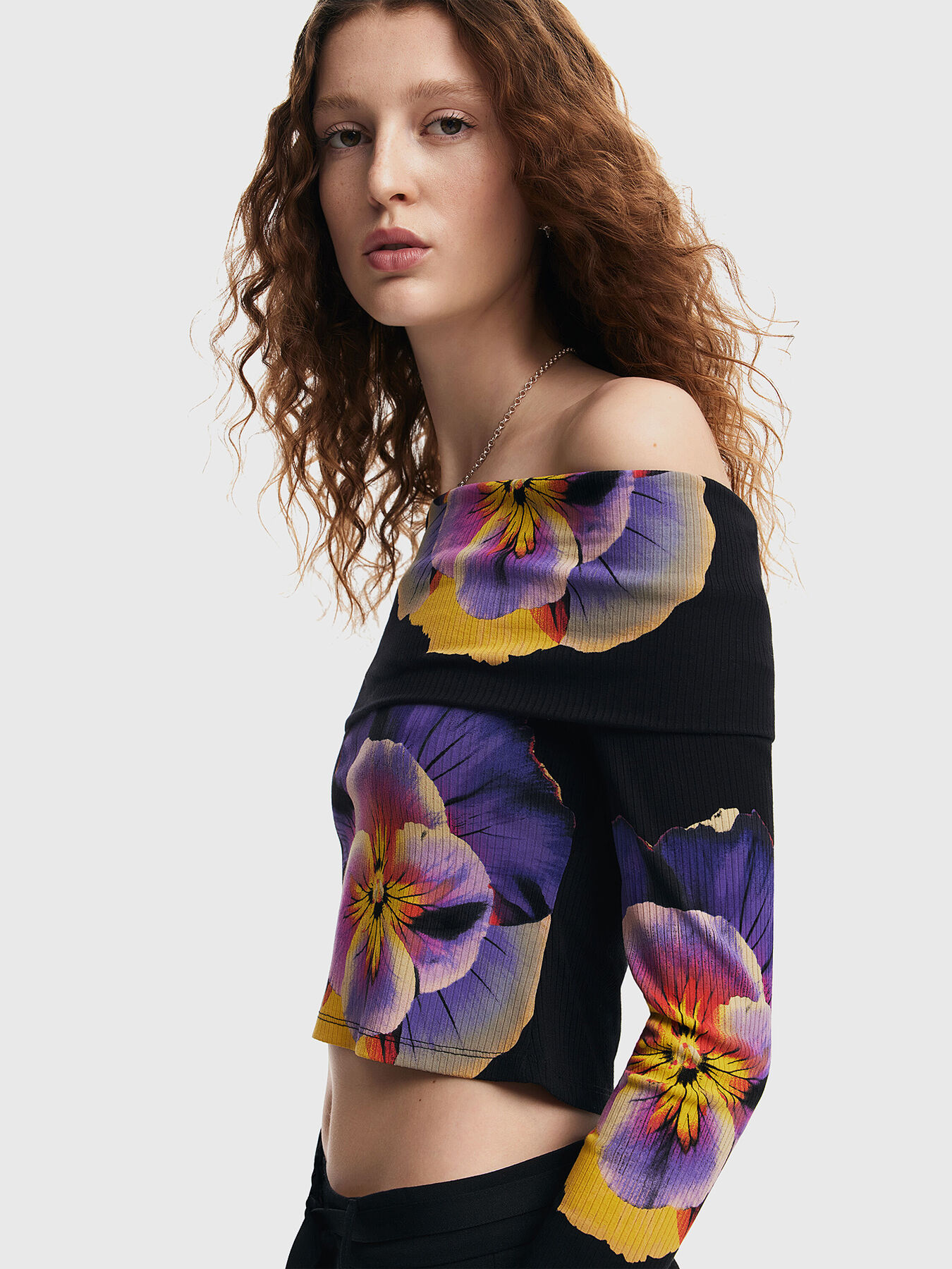 Off the shoulder blouse and floral accents brand DESIGUAL