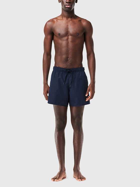 Yellow shorts with logo detail - 1