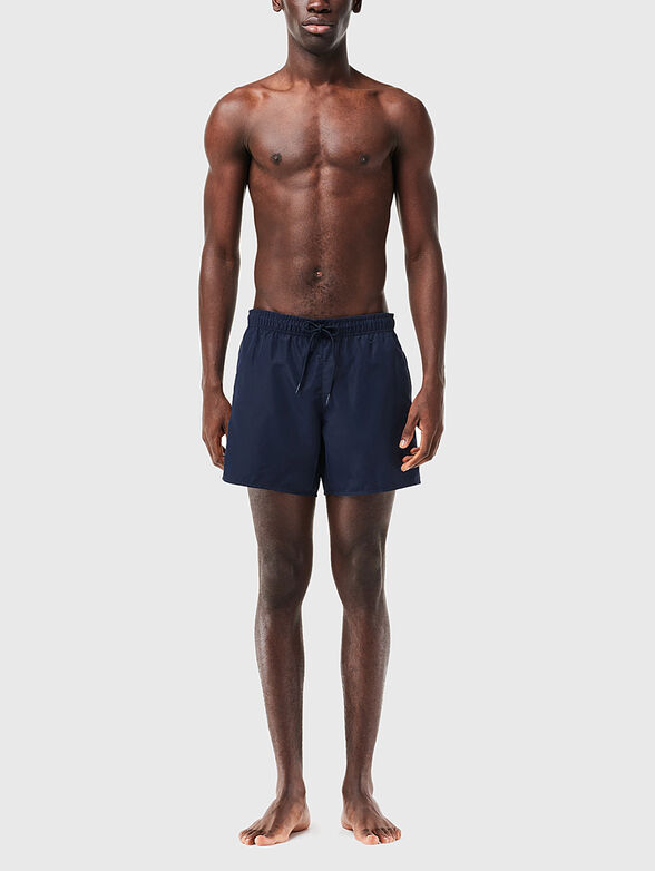 Yellow shorts with logo detail - 1