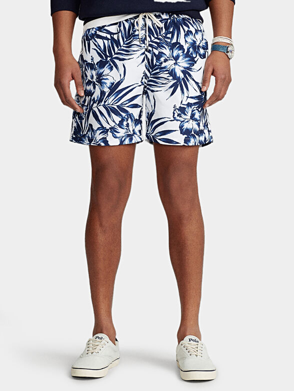 Swim trunks with tropical print - 1