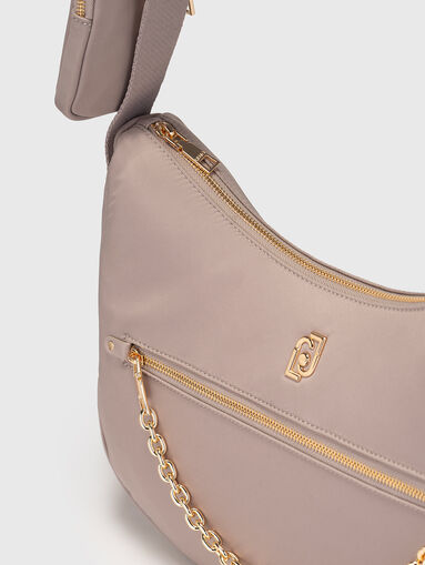 Hobo bag with golden details ana logo - 5