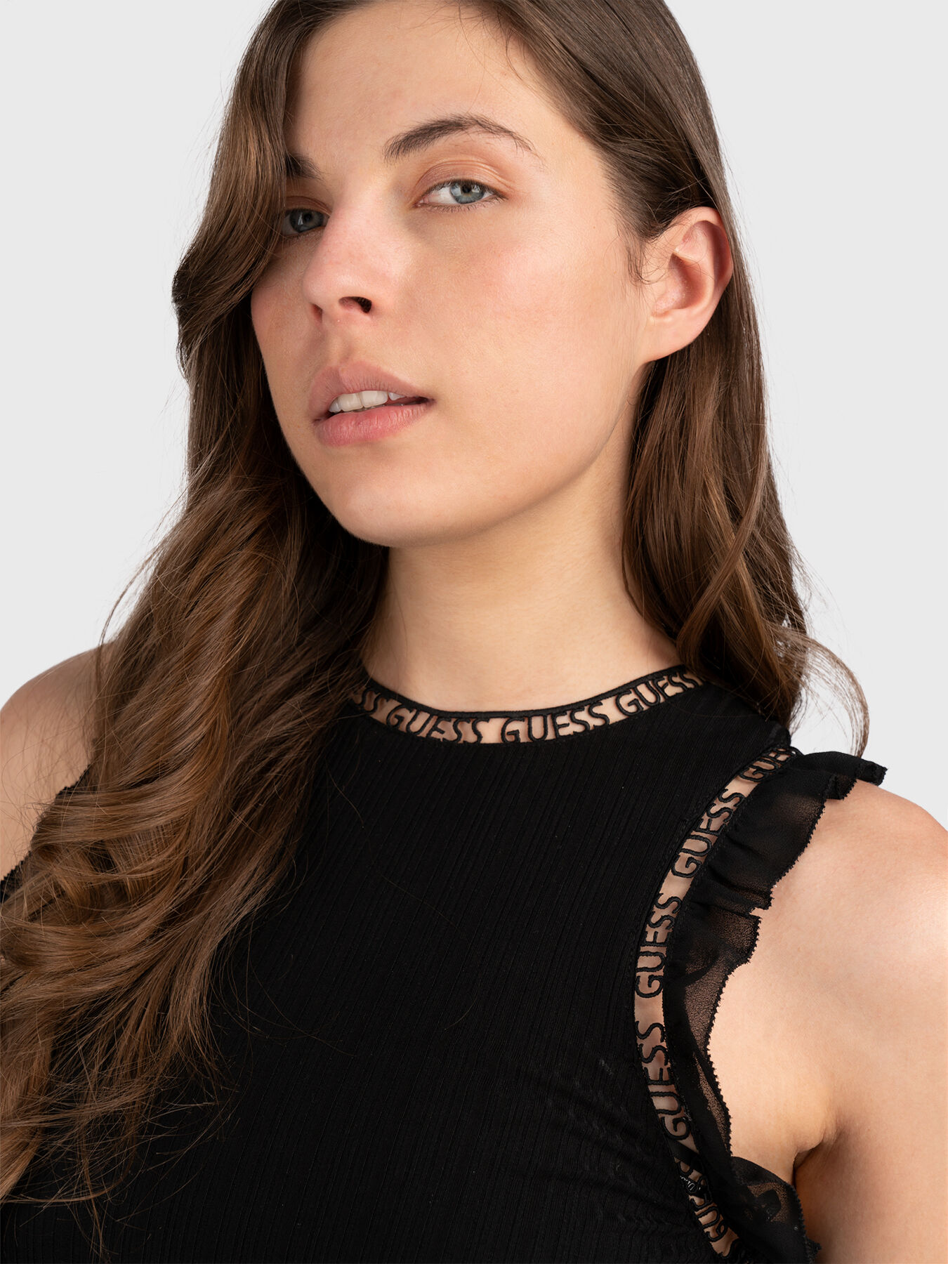 OLGA black dress with ruffled accent and logo lace brand GUESS Globalbrandsstore en