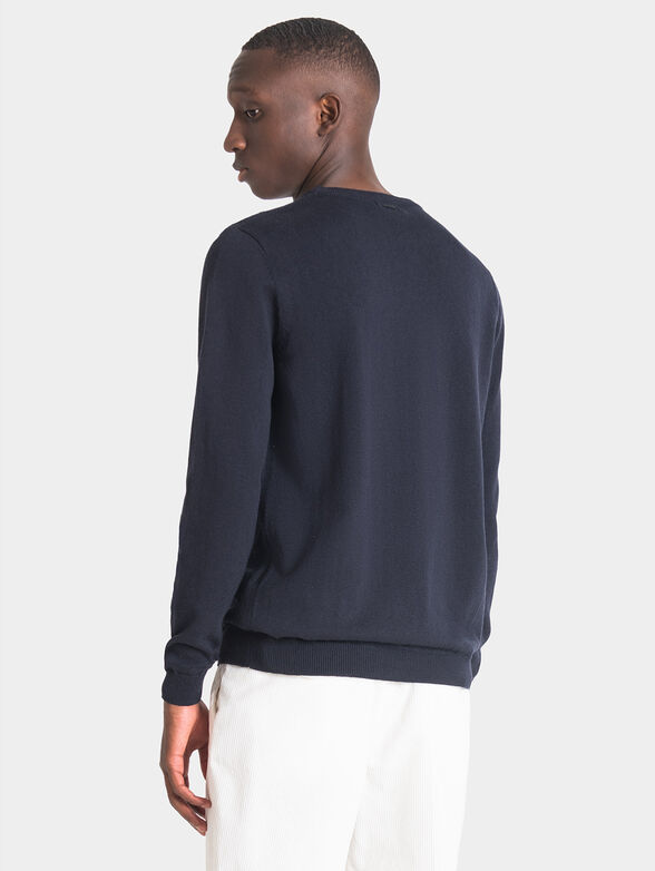 Blue sweater with art details - 2