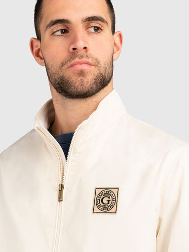 Blue jacket with zip and logo patch - 5