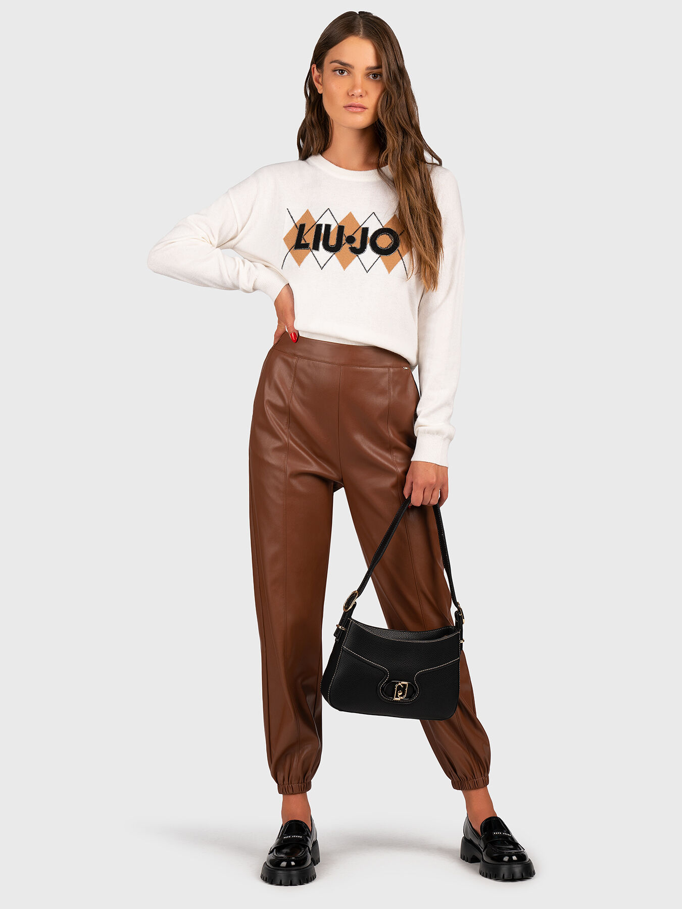 Black faux leather pants brand LIU JO — Globalbrandsstore.com/en