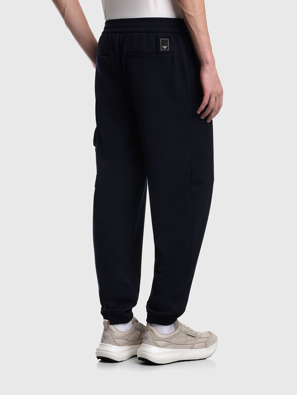 Dark blue trousers with a textured pattern - 2