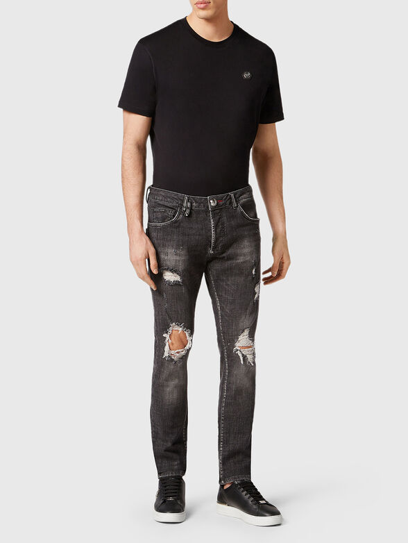 Blue jeans with washed effect and accent rips - 4