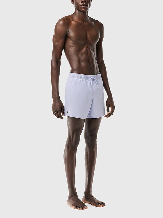 Yellow shorts with logo detail - 1