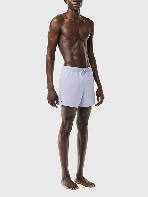 Yellow shorts with logo detail - 1