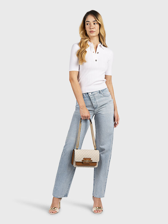 Light blue jeans with asymmetric fastening - 4