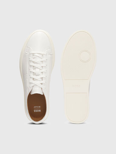 Low top trainers in leather with embossed logo - 5