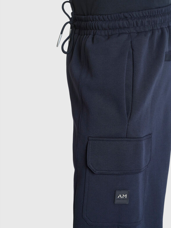 Sports pants with accent pockets - 4