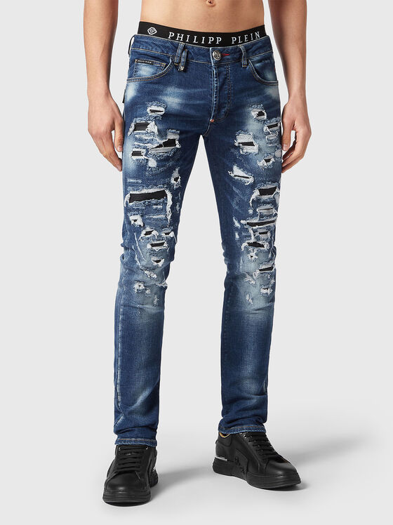 Slim jeans with ripped accents - 1