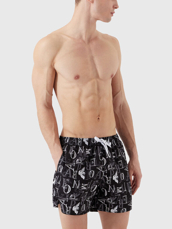 Beach shorts with artistic logo print - 2