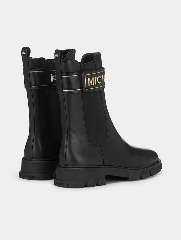 Black leather ankle boots with golden logo  - 3