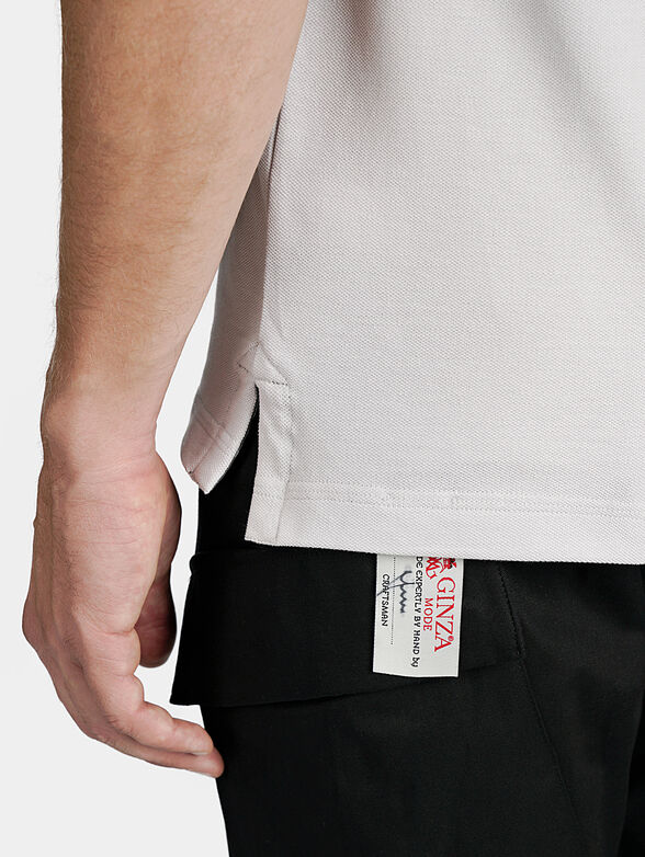 Grey polo-shirt with contrasting embroideries - 6