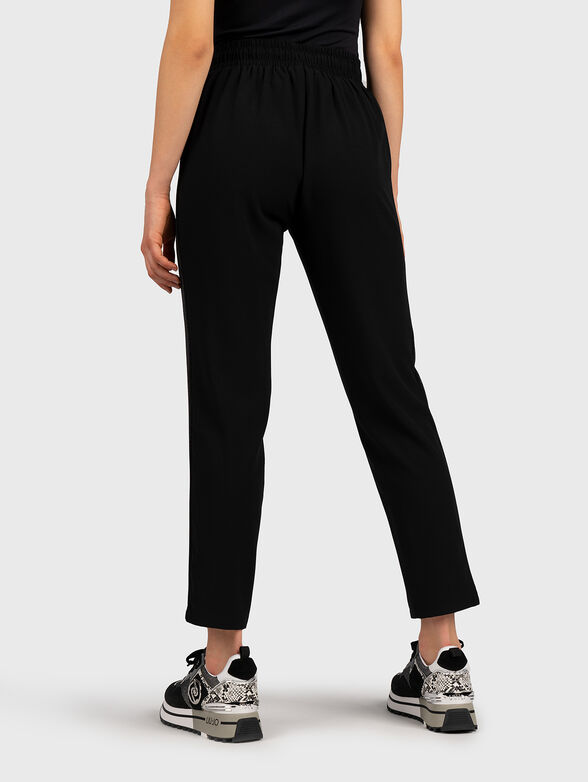 Black sports pants with shiny accent - 2