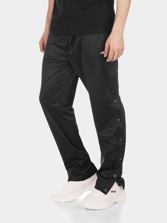 NAOLIN Track pants with lateral buttons - 1