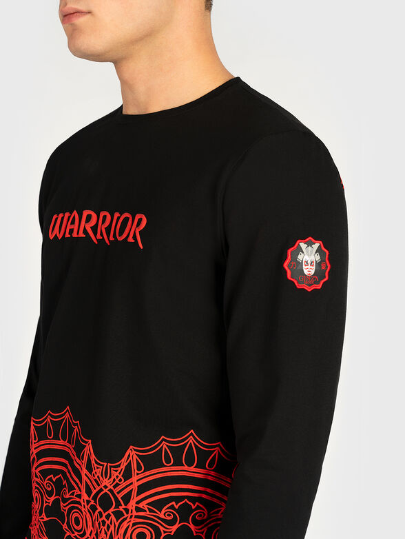 Black blouse with contrasting print - 2