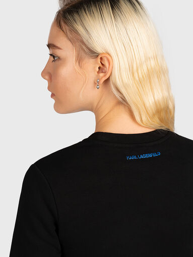 Sweatshirt with logo accent from applied rhinestones - 5