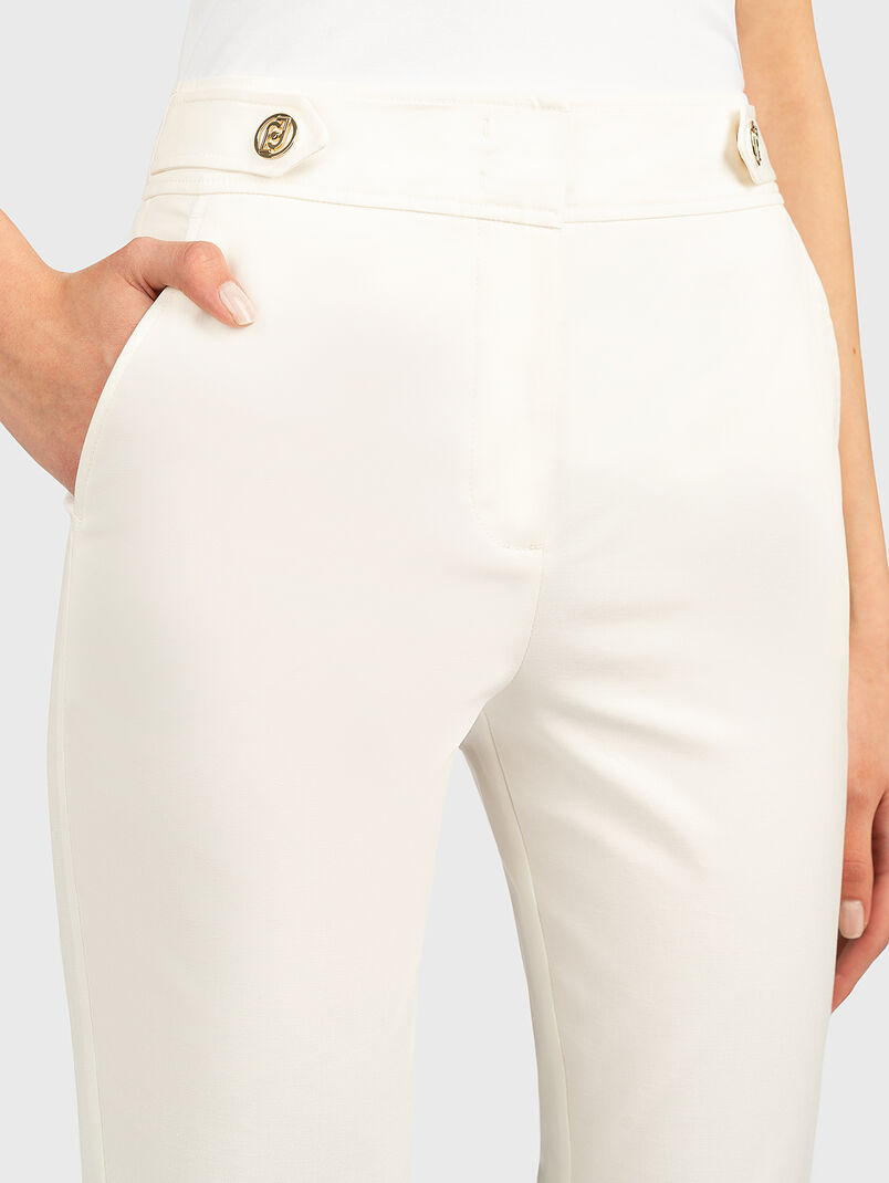 Slim trousers in beige color - 3
