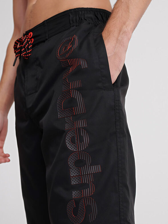 Black beach shorts - 4